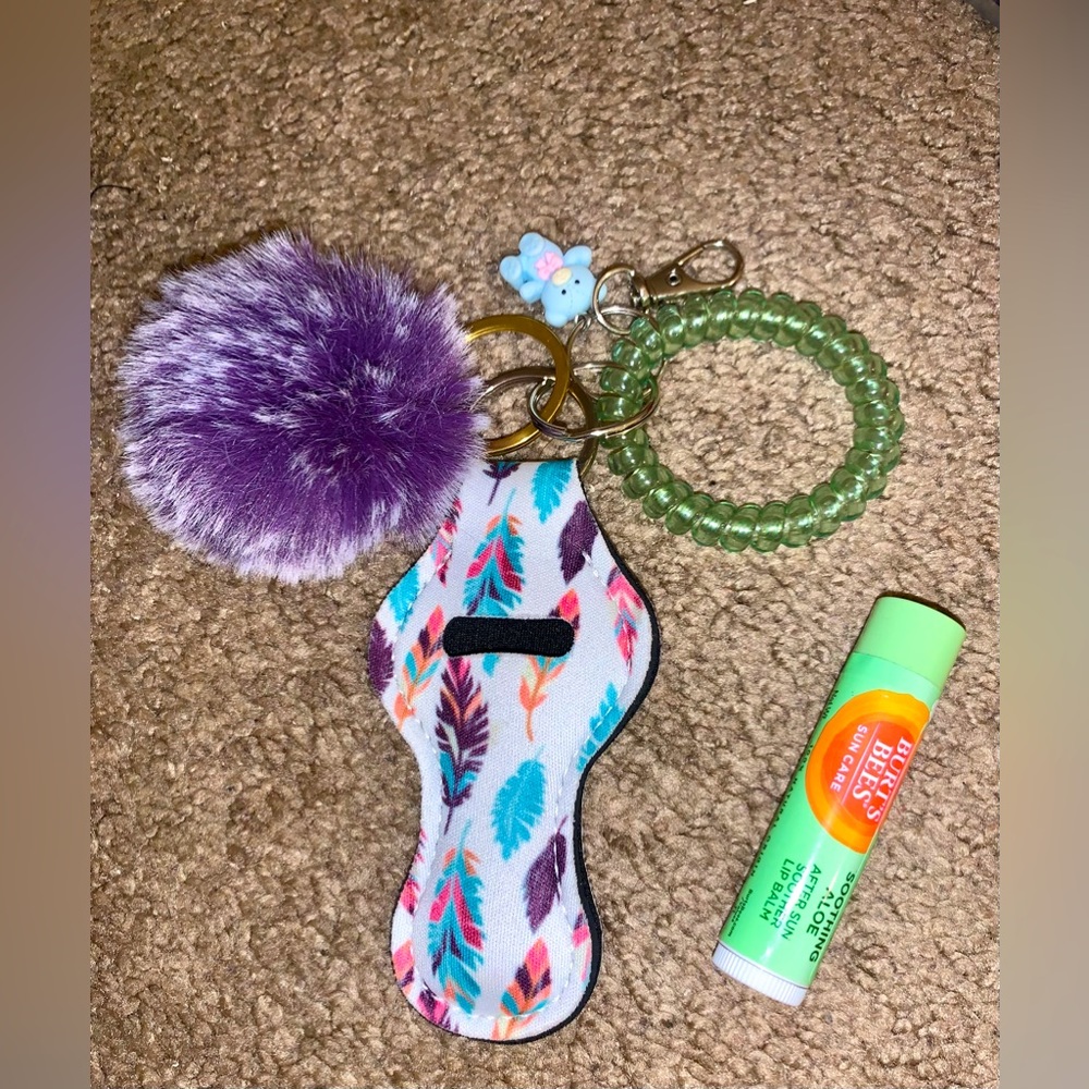 NWOT Feather keychain chapstick holder set